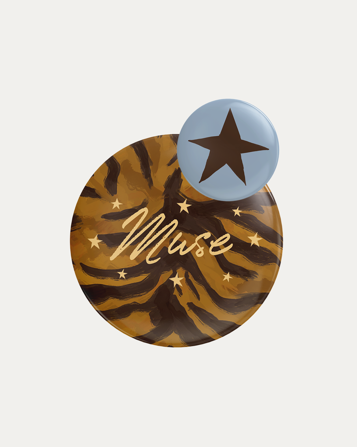 Round decorative item with tiger stripe pattern, blue circle with star, and 'Muse' text on a white background